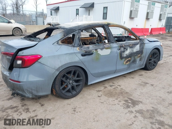 2022 Honda Civic Sport with VIN 2HGFE2F5XNH553141, listed as a IAAI auction lot 41610028 with Not Provided miles and . Bid and sale history available at DreamBid. Image 4.