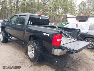 2009 Chevrolet Silverado 1500 LTZ with VIN 3GCEK33309G212297, listed as a IAAI auction lot 41716572 with 158,451 mi miles. Bid and sale history available at carsss.com. Image 3.