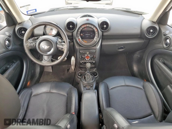 2015 MINI Countryman S z VIN WMWZC3C52FWT05252, wystawiony jako Copart lot #58559475 z przebiegiem 104 825 mil mil oraz Szkoda całkowita • Salvage title. Historia ofert i sprzedaży dostępna na DreamBid. Obrazek 8.