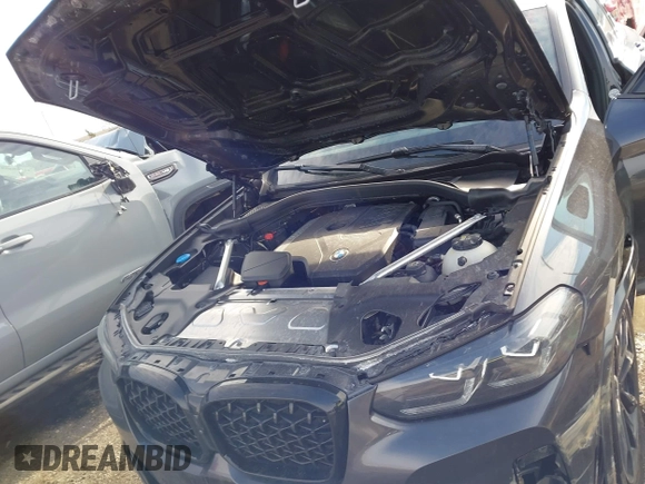 2023 BMW X4 xDrive30i with VIN 5UX33DT08P9S91679, listed as a IAAI auction lot 41705086 with 23,534 mi miles and . Bid and sale history available at DreamBid. Image 10.