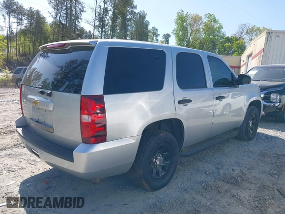 2013 Chevrolet Tahoe Commercial with VIN 1GNLC2E03DR124278, listed as a IAAI auction lot 39201429 with 182,584 mi miles and . Bid and sale history available at DreamBid. Image 4.