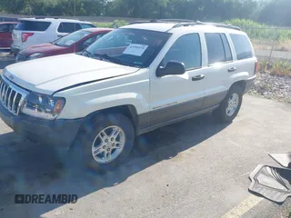2002 Jeep Grand Cherokee Laredo with VIN 1J4GW48S22C131470, listed as a IAAI auction lot 42599375 with 200,815 mi miles and . Bid and sale history available at DreamBid. Image 2.
