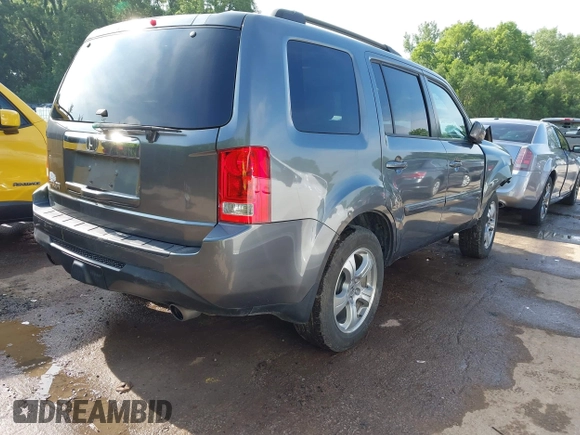 2013 Honda Pilot EX-L with VIN 5FNYF3H59DB038966, listed as a IAAI auction lot 42461394 with 142,684 mi miles and . Bid and sale history available at DreamBid. Image 4.