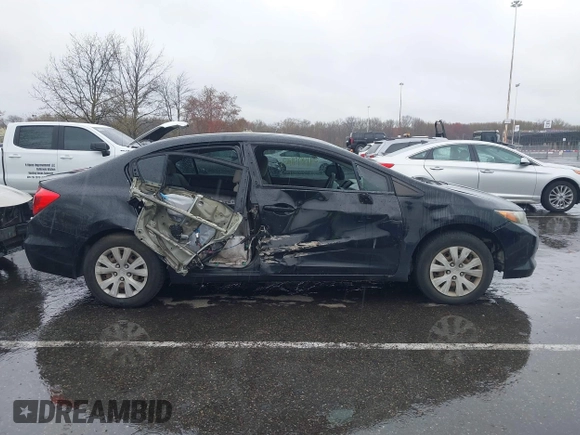 2012 Honda Civic LX with VIN 2HGFB2F5XCH605230, listed as a IAAI auction lot 41999663 with 221,815 mi miles and . Bid and sale history available at DreamBid. Image 13.