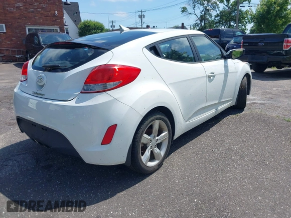 2013 Hyundai Veloster RE:MIX with VIN KMHTC6AD4DU173426, listed as a IAAI auction lot 42551270 with 91,560 mi miles and . Bid and sale history available at DreamBid. Image 4.