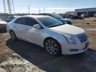 2013 Cadillac XTS Platinum z VIN 2G61V5S33D9235209, wystawiony jako Copart lot #46158375 z przebiegiem 178 848 mil mil oraz Szkody całkowita. Historia ofert i sprzedaży dostępna na DreamBid. Obrazek 4.