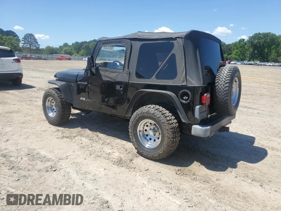 1999 Jeep Wrangler SE with VIN 1J4FY29P3XP408468, listed as a Copart auction lot 55537335 with Not provided miles and Salvage title. Bid and sale history available at DreamBid. Image 3.