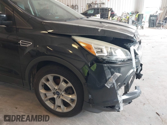 2014 Ford Escape Titanium с VIN 1FMCU0J9XEUA90770, выставлен на аукционе IAAI как лот 42354947 с пробегом 96 296 миль миль и . История ставок и продаж доступна на DreamBid. Изображение 13.