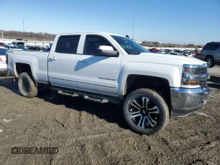 2016 Chevrolet Silverado 1500 LT with VIN 3GCUKREC9GG259501, listed as a Copart auction lot 87671785 with 159,336 mi miles and Salvage Title. Bid and sale history available at DreamBid. Image 4.