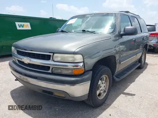 2002 Chevrolet Tahoe LS z VIN 1GNEC13ZX2R135330, wystawiony jako IAAI lot #42526127 z przebiegiem 277 208 mil mil oraz . Historia ofert i sprzedaży dostępna na DreamBid. Obrazek 2.