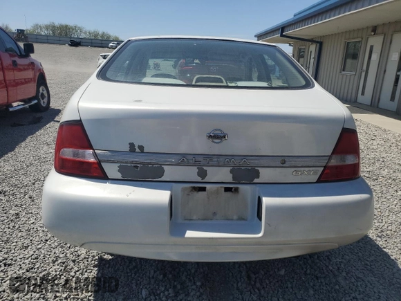 2000 Nissan Altima XE z VIN 1N4DL01D7YC190776, wystawiony jako Copart lot #53376635 z przebiegiem 211 582 mil mil oraz Szkoda całkowita • Salvage title. Historia ofert i sprzedaży dostępna na DreamBid. Obrazek 6.