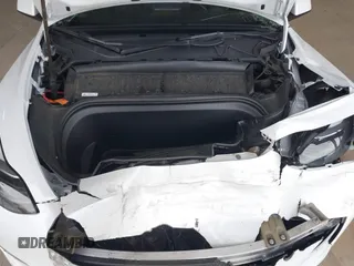 2023 Tesla Model Y Long Range z VIN 7SAYGDEE2PF834036, wystawiony jako IAAI lot #41933120 z przebiegiem 27 872 mil mil oraz . Historia ofert i sprzedaży dostępna na DreamBid. Obrazek 10.
