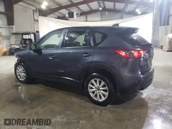 2014 Mazda CX-5 Touring with VIN JM3KE4CY8E0335573, listed as a Copart auction lot 46471085 with 80,041 mi miles and Salvage Title. Bid and sale history available at carsss.com. Image 2.