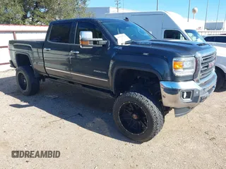 2018 GMC Sierra 2500HD SLT with VIN 1GT12TEY8JF139452, listed as a IAAI auction lot 41253932 with 202,672 mi miles. Bid and sale history available at carsss.com. Image 1.