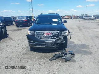 2019 GMC Acadia Denali with VIN 1GKKNXLS7KZ226863, listed as a IAAI auction lot 42070890 with 65,031 mi miles and . Bid and sale history available at DreamBid. Image 13.