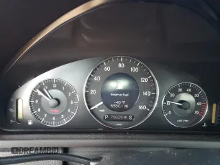 2005 Mercedes-Benz CLK 500 with VIN WDBTK75J55F163229, listed as a Copart auction lot 76276354 with 76,829 mi miles and Salvage Title. Bid and sale history available at DreamBid. Image 9.