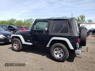 2002 Jeep Wrangler X z VIN 1J4FA39S12P759967, wystawiony jako Copart lot #57851495 z przebiegiem 178 035 mil mil oraz Szkoda całkowita • Salvage title. Historia ofert i sprzedaży dostępna na DreamBid. Obrazek 2.