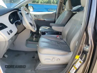 2012 Toyota Sienna XLE with VIN 5TDDK3DC5CS036642, listed as a Copart auction lot 60503325 with 199,097 mi miles and Clean title. Bid and sale history available at DreamBid. Image 7.
