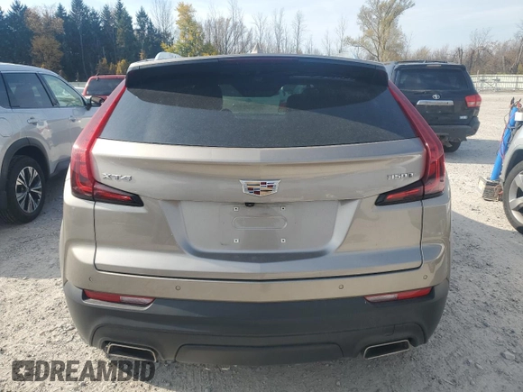 2022 Cadillac XT4 FWD Luxury with VIN 1GYAZAR4XNF121008, listed as a Copart auction lot 77599974 with 29,141 mi miles and Salvage title. Bid and sale history available at DreamBid. Image 6.
