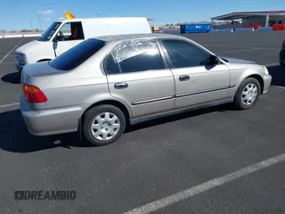 2000 Honda Civic LX with VIN 1HGEJ6672YL053837, listed as a IAAI auction lot 41778864 with 368,139 mi miles. Bid and sale history available at carsss.com. Image 4.