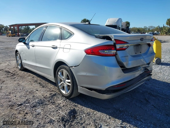 2018 Ford Fusion Hybrid S with VIN 3FA6P0UU8JR244912, listed as a IAAI auction lot 41742940 with 65,885 mi miles. Bid and sale history available at carsss.com. Image 3.