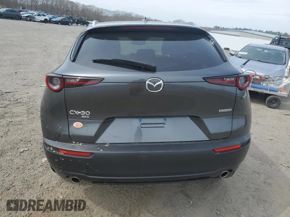 2024 Mazda CX-30 S Premium z VIN 3MVDMBDM1RM630617, wystawiony jako Copart lot #54355095 z przebiegiem 9 634 mil mil oraz Szkoda całkowita • Salvage title. Historia ofert i sprzedaży dostępna na DreamBid. Obrazek 6.