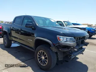 2018 Chevrolet Colorado 4WD ZR2 z VIN 1GCGTEEN5J1259764, wystawiony jako IAAI lot #42474810 z przebiegiem 111 187 mil mil oraz . Historia ofert i sprzedaży dostępna na DreamBid. Obrazek 1.