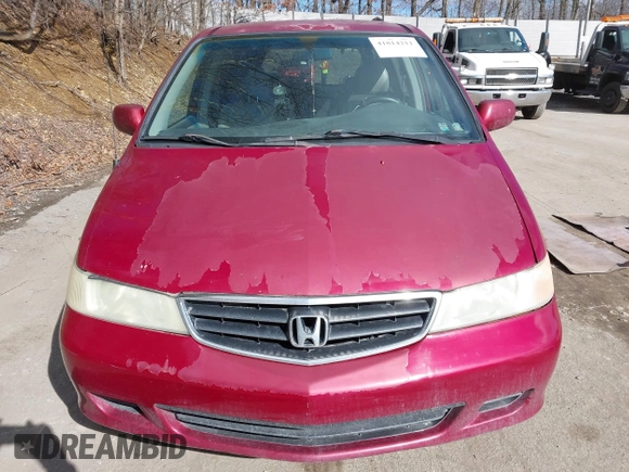 2003 Honda Odyssey EX-L with VIN 5FNRL18923B130410, listed as a IAAI auction lot 41814211 with 209,335 mi miles and . Bid and sale history available at DreamBid. Image 12.