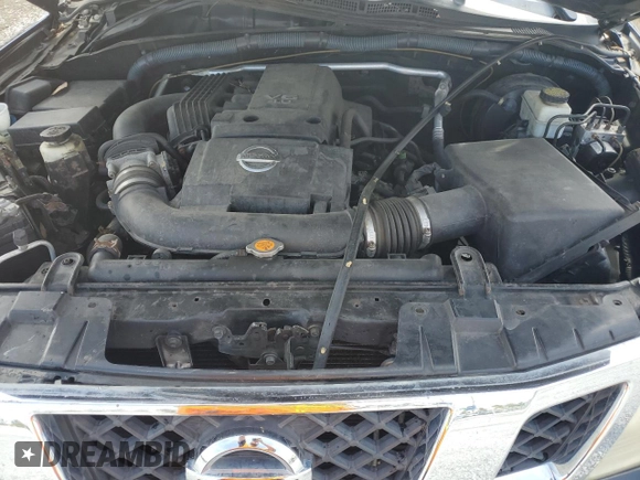 2010 Nissan Frontier Pro-4X with VIN 1N6AD0EV2AC401933, listed as a Copart auction lot 53980575 with 188,170 mi miles and Salvage title. Bid and sale history available at DreamBid. Image 11.