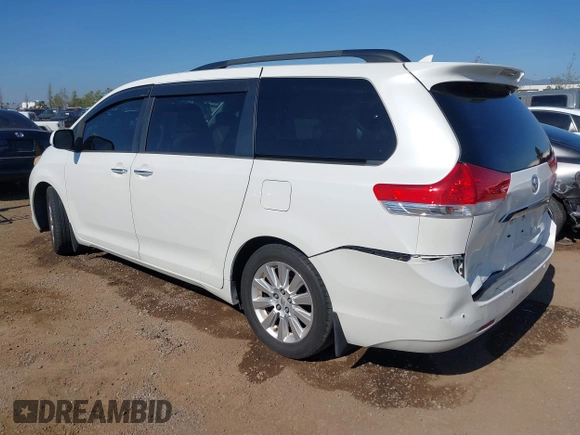 2011 Toyota Sienna XLE AAS with VIN 5TDYK3DCXBS097582, listed as a IAAI auction lot 42233594 with 226,902 mi miles and . Bid and sale history available at DreamBid. Image 3.