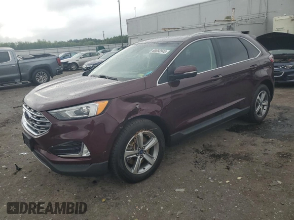 2019 Ford Edge SEL with VIN 2FMPK4J92KBB34891, listed as a Copart auction lot 60050945 with 104,942 mi miles and Salvage title. Bid and sale history available at DreamBid. Image 1.