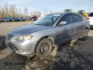 2005 Mazda 3 i with VIN JM1BK12F751242280, listed as a Copart auction lot 84316214 with 222,131 mi miles and Salvage Title. Bid and sale history available at DreamBid. Image 1.