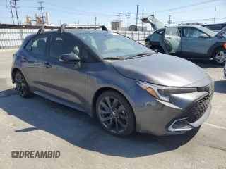 2023 Toyota Corolla Hatchback XSE with VIN JTNC4MBE4P3197390, listed as a Copart auction lot 60291254 with 4,556 mi miles and Salvage Title. Bid and sale history available at carsss.com. Image 4.