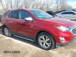 2019 Chevrolet Equinox Premier z VIN 2GNAXXEV1K6205826, wystawiony jako IAAI lot #41582968 z przebiegiem 98 080 mil mil oraz . Historia ofert i sprzedaży dostępna na DreamBid. Obrazek 1.