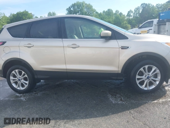 2017 Ford Escape SE with VIN 1FMCU9GD1HUC70823, listed as a IAAI auction lot 41898457 with 86,042 mi miles and . Bid and sale history available at DreamBid. Image 13.