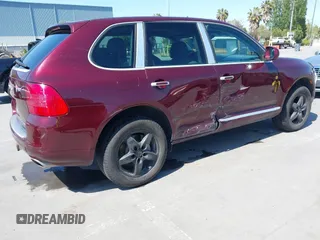 2005 Porsche Cayenne S with VIN WP1AB29P05LA63064, listed as a IAAI auction lot 42153705 with 147,843 mi miles and . Bid and sale history available at DreamBid. Image 4.