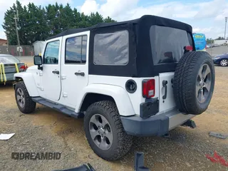 2018 Jeep Wrangler Unlimited Altitude with VIN 1C4HJWEGXJL870606, listed as a IAAI auction lot 42693031 with 92,735 mi miles and . Bid and sale history available at DreamBid. Image 3.