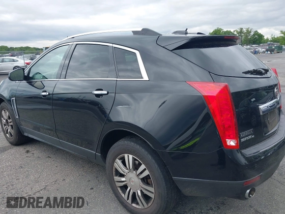 2015 Cadillac SRX Luxury Collection z VIN 3GYFNEE34FS510360, wystawiony jako IAAI lot #42343737 z przebiegiem 149 046 mil mil oraz . Historia ofert i sprzedaży dostępna na DreamBid. Obrazek 19.