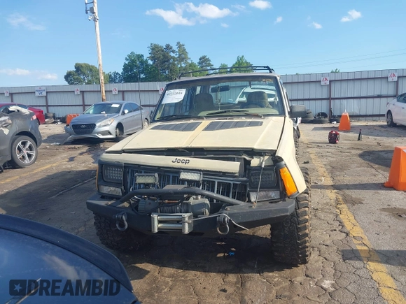 1995 Jeep Cherokee Sport with VIN 1J4FJ68S3SL555908, listed as a IAAI auction lot 42222016 with 283,444 mi miles and . Bid and sale history available at DreamBid. Image 12.