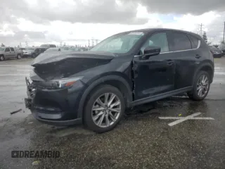 2020 Mazda CX-5 Grand Touring with VIN JM3KFADM3L0815055, listed as a Copart auction lot 48175245 with 56,602 mi miles and Salvage Title. Bid and sale history available at carsss.com. Image 1.