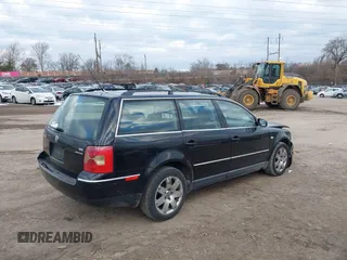 2003 Volkswagen Passat GLX with VIN WVWYH63B23E073924, listed as a IAAI auction lot 41447079 with 160,263 mi miles. Bid and sale history available at carsss.com. Image 4.