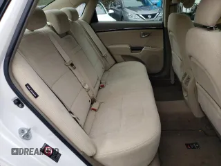 2010 Hyundai Azera GLS z VIN KMHFC4DD4AA513796, wystawiony jako Copart lot #59782965 z przebiegiem 56 958 mil mil oraz Szkoda całkowita • Salvage title. Historia ofert i sprzedaży dostępna na DreamBid. Obrazek 10.