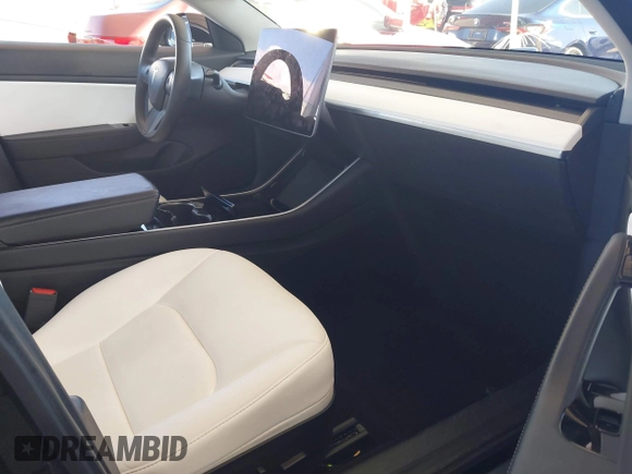 2020 Tesla Model 3 Standard Range Plus with VIN 5YJ3E1EA8LF661982, listed as a IAAI auction lot 41700109 with 30,271 mi miles and . Bid and sale history available at DreamBid. Image 5.