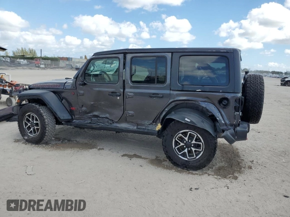 2024 Jeep Wrangler Rubicon z VIN 1C4PJXFG6RW261748, wystawiony jako Copart lot #44166485 z przebiegiem 7 911 mil mil oraz Szkoda całkowita • Salvage title. Historia ofert i sprzedaży dostępna na DreamBid. Obrazek 2.