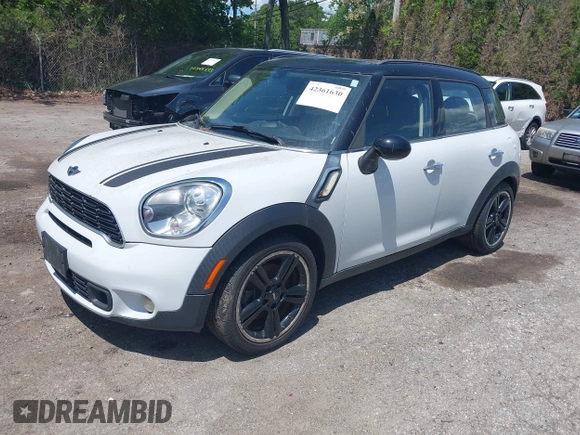 2012 MINI Countryman S z VIN WMWZC3C58CWM26699, wystawiony jako IAAI lot #42361630 z przebiegiem 88 177 mil mil oraz . Historia ofert i sprzedaży dostępna na DreamBid. Obrazek 2.
