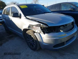 2018 Dodge Journey SE with VIN 3C4PDCAB5JT535737, listed as a IAAI auction lot 41482966 with 97,001 mi miles. Bid and sale history available at carsss.com. Image 1.