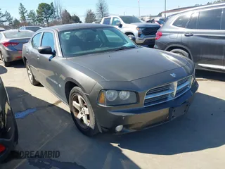 2010 Dodge Charger SXT with VIN 2B3CA3CV6AH185978, listed as a IAAI auction lot 41661822 with 166,601 mi miles. Bid and sale history available at carsss.com. Image 1.