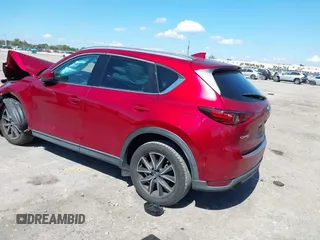 2018 Mazda CX-5 Grand Touring with VIN JM3KFADM0J0377091, listed as a IAAI auction lot 41677544 with 91,758 mi miles. Bid and sale history available at carsss.com. Image 3.