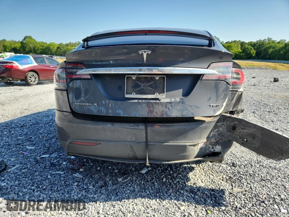 2017 Tesla Model X 90D z VIN 5YJXCBE22HF060645, wystawiony jako Copart lot #57907115 z przebiegiem 55 343 mil mil oraz Szkoda całkowita • Salvage title. Historia ofert i sprzedaży dostępna na DreamBid. Obrazek 6.