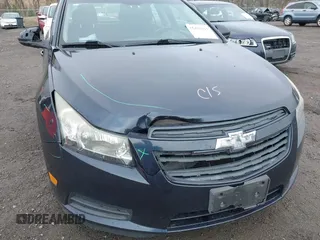 2013 Chevrolet Cruze 1LT with VIN 1G1PC5SB5D7312533, listed as a IAAI auction lot 41875213 with 94,953 mi miles and . Bid and sale history available at DreamBid. Image 6.